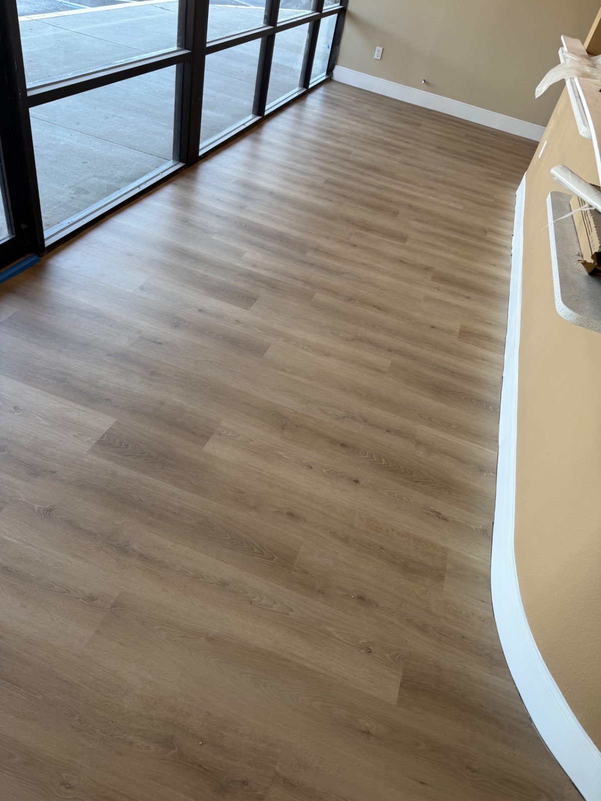 Commercial Oak LVP — luxury vinyl flooring by American Apex Construction
